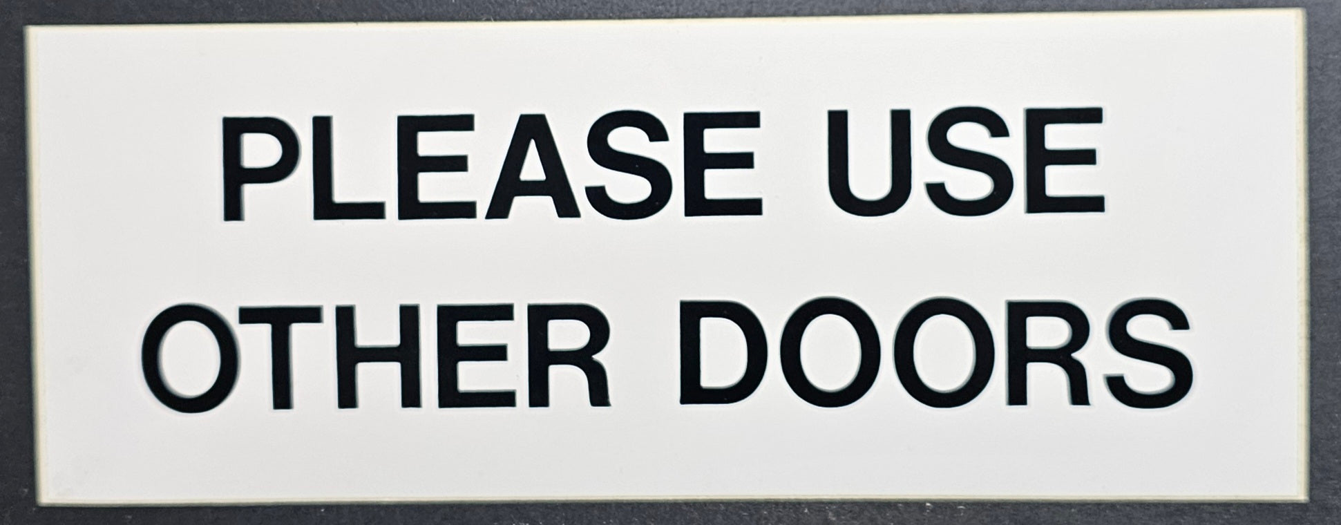 200. PLEASE USE OTHER DOOR (STICKER)