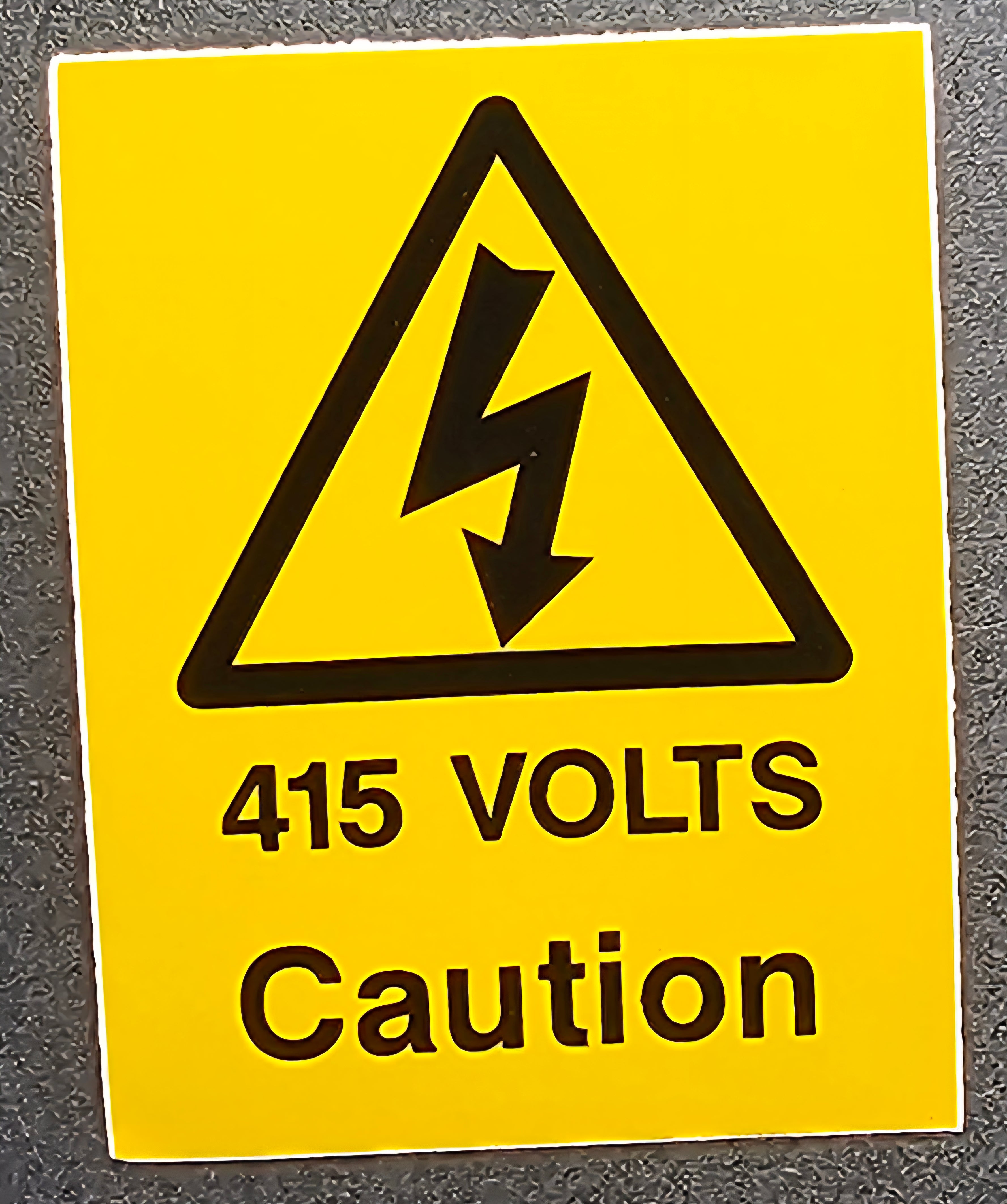 240. 415 VOLTS CAUTION (STICKER)