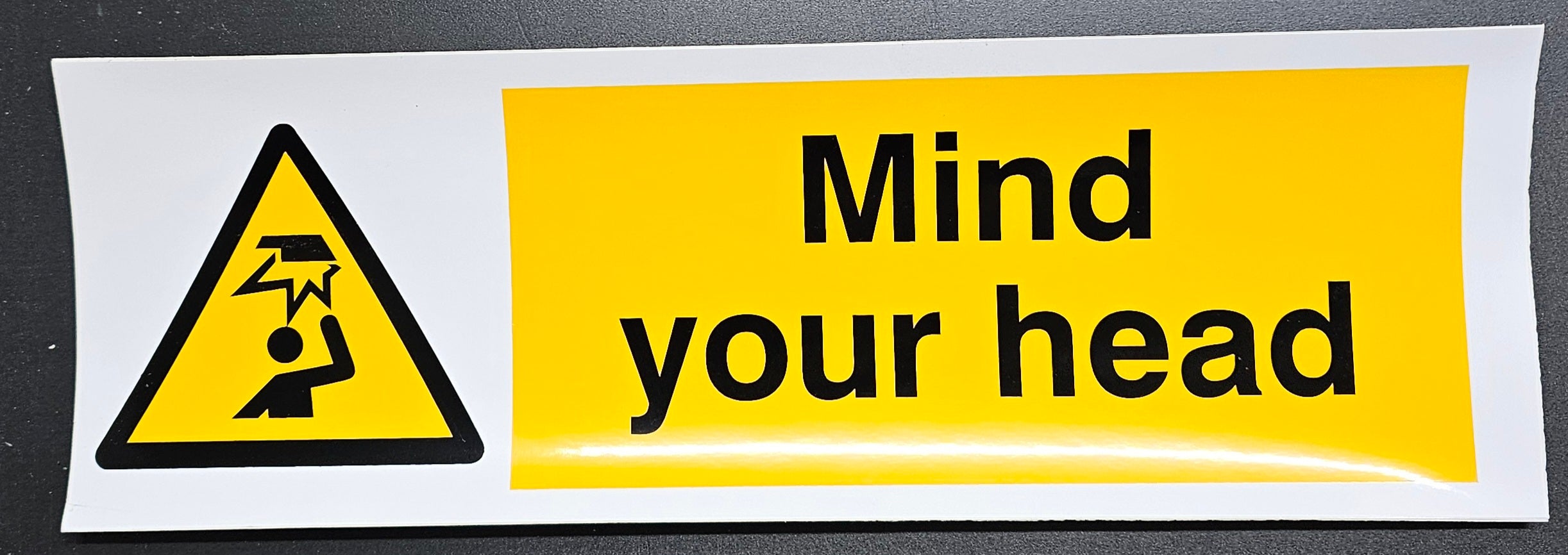 86. MIND YOUR HEAD (STICKER)